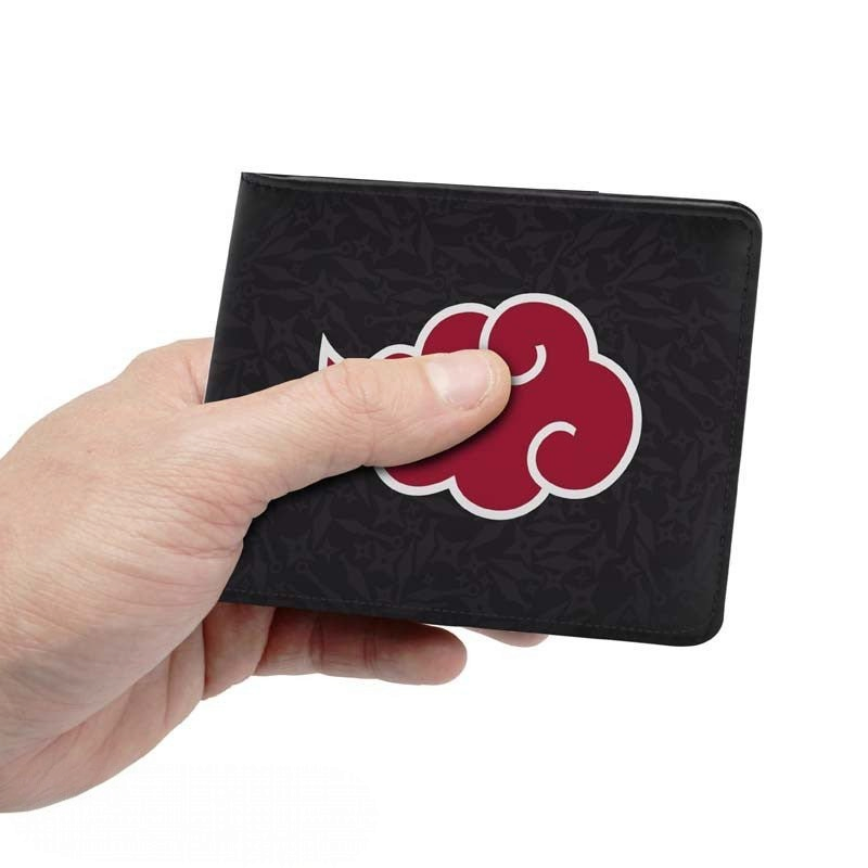 Fans Geek Store Naruto Shippuden Akatsuki vinyl wallet in black with a red cloud logo held in a hand