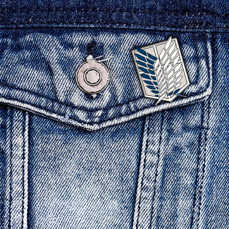 Fans Geek Store Attack on Titan Scouts metal pin featuring the Wings of Freedom emblem attached to a denim jacket