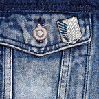 Fans Geek Store Attack on Titan Scouts metal pin featuring the Wings of Freedom emblem attached to a denim jacket
