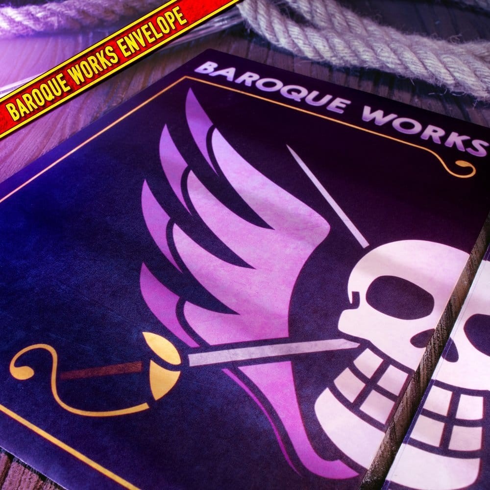 Fans Geek Store One Piece Baroque Works themed envelope with purple skull and wing logo on a wooden surface
