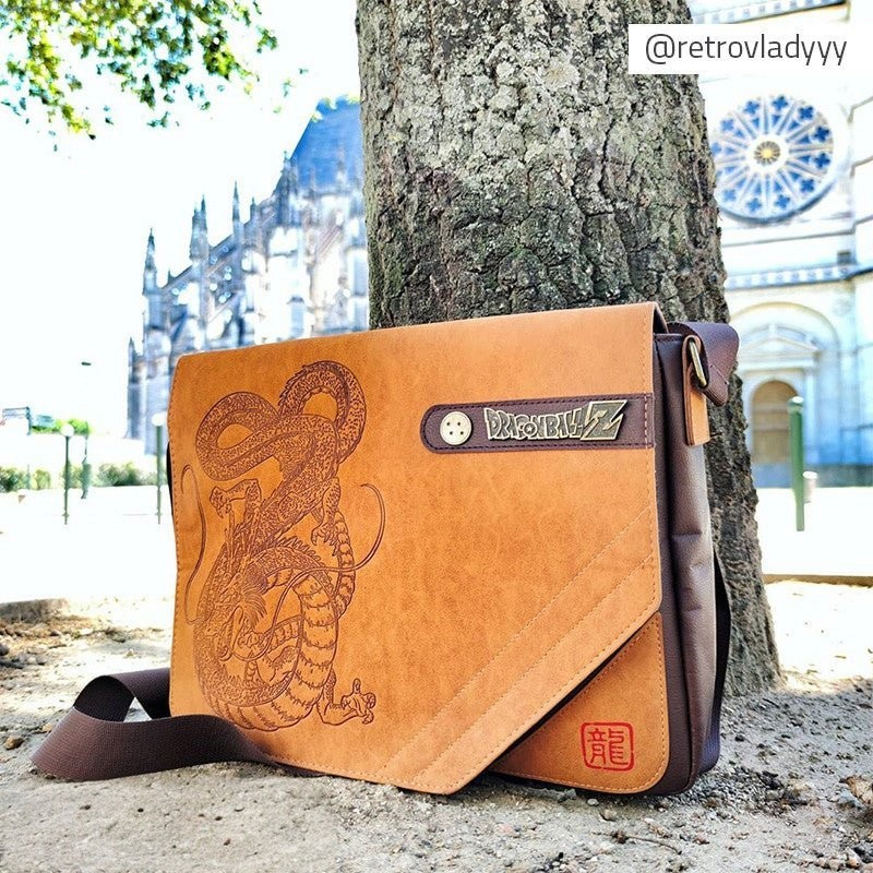Fans Geek Store Dragon Ball Shenron shoulder bag in tan faux suede with metal details and adjustable strap