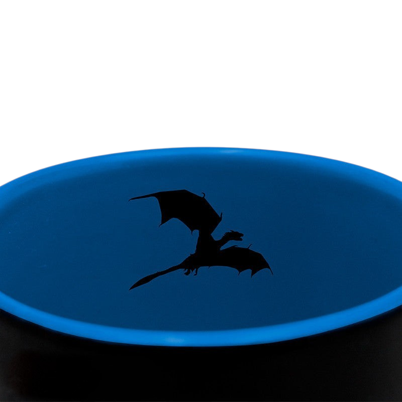 Fans Geek Store Game of Thrones ceramic mug interior with a black dragon silhouette on a vibrant blue background