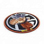 Fans Geek Store round Dragon Ball Super mousepad featuring Goku in Ultra Instinct form with a non-slip rubber base