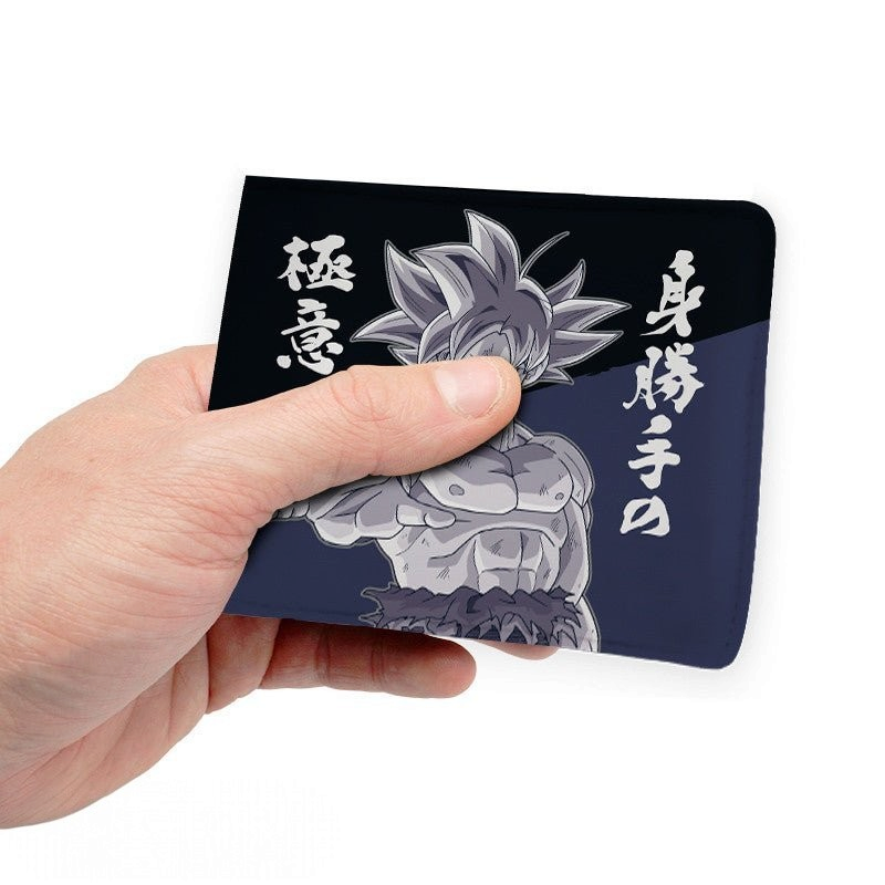 Fans Geek Store vinyl wallet featuring Goku in Ultra Instinct form from Dragon Ball Super held in a hand