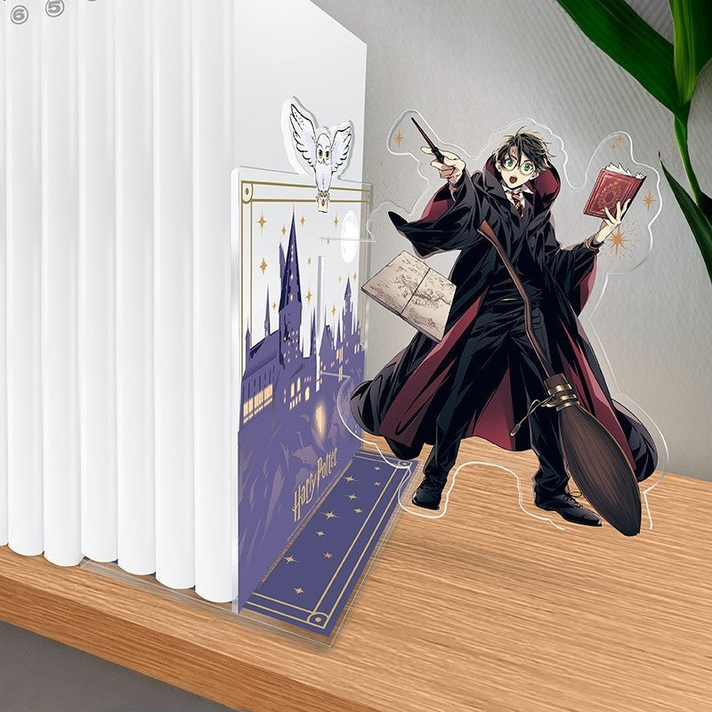 Fans Geek Store Harry Potter acrylic bookend featuring Harry with wand and broomstick next to a Hogwarts castle scene
