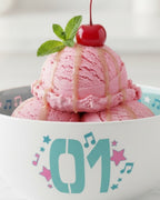 Fans Geek Store Hatsune Miku stoneware bowl filled with pink ice cream scoops topped with a cherry and mint leaf.
