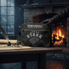 Fans Geek Store Game of Thrones House Stark shoulder bag in black polyurethane with Winterfell logo on a desk