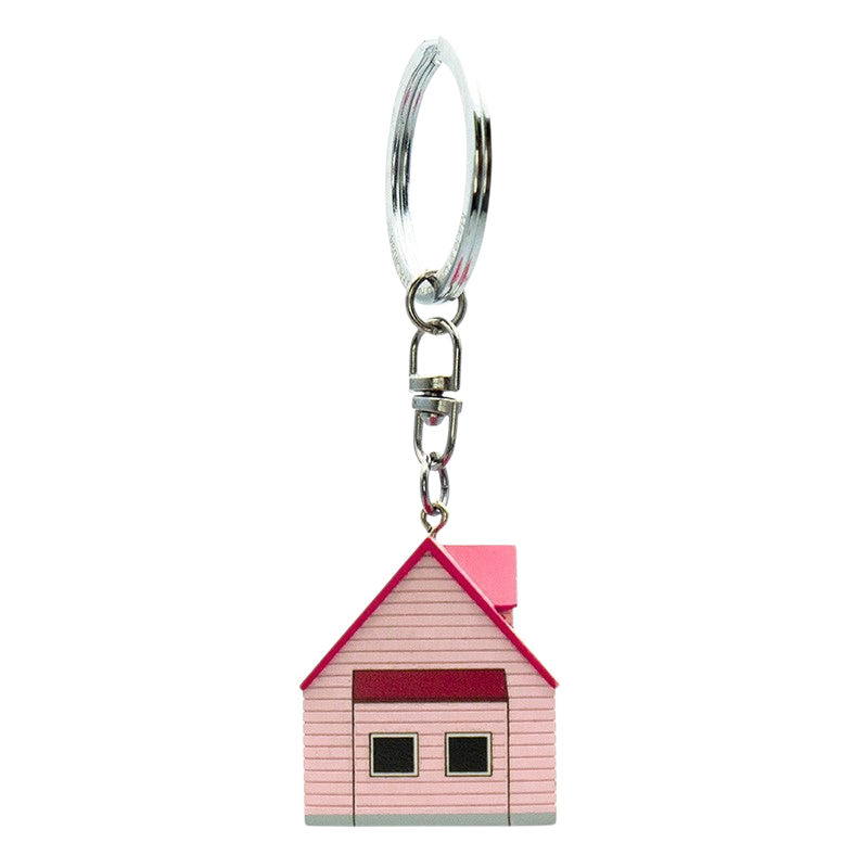 Fans Geek Store Dragon Ball Z 3D Kame House keychain in pink plastic, featuring Master Roshi's iconic island home.