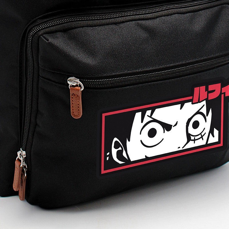 Fans Geek Store black polyester One Piece backpack featuring a graphic of Monkey D. Luffy on the front pocket.