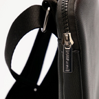 Fans Geek Store Sailor Moon Luna shoulder bag featuring black textured material, metal zipper, and adjustable strap