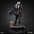 Fans Geek Store Iron Studios 1:4 scale polystone statue of The Mandalorian and Grogu with detailed armor and cape.
