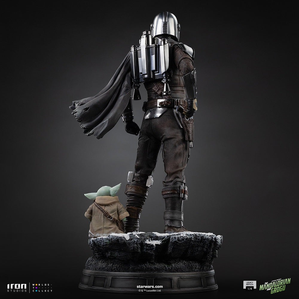 Fans Geek Store Iron Studios 1:4 scale polystone statue of The Mandalorian and Grogu with detailed armor and cape.