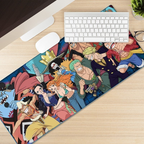 Fans Geek Store One Piece XXL desk mat featuring the Straw Hat Crew with stitched edges on a wooden desk surface.