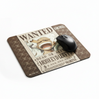 Fans Geek Store One Piece mousepad featuring Monkey D. Luffy Wanted poster design with a black computer mouse on top.