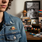 Fans Geek Store metal One Piece Luffy straw hat pin attached to a blue denim jacket