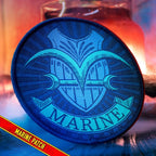 Fans Geek Store One Piece Marine faction embroidered patch with blue shield emblem and banner on a dark background