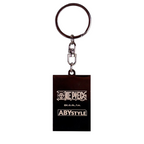 Fans Geek Store metal One Piece keychain featuring the Abystyle logo and series branding on a dark rectangular tag