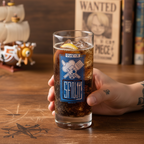 Fans Geek Store One Piece Sanji glass with blue Jolly Roger logo filled with cola and lemon on a wooden table