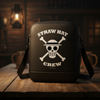 Fans Geek Store black One Piece shoulder bag featuring the white Straw Hat Crew skull logo on a wooden table