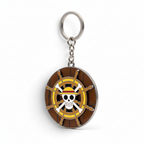 Fans Geek Store One Piece Thousand Sunny metal keychain featuring a rotating ship steering wheel with a skull logo