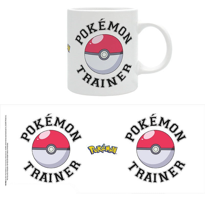 Fans Geek Store white ceramic Pokémon Trainer mug with a Poké Ball graphic and official logo, 320ml capacity.