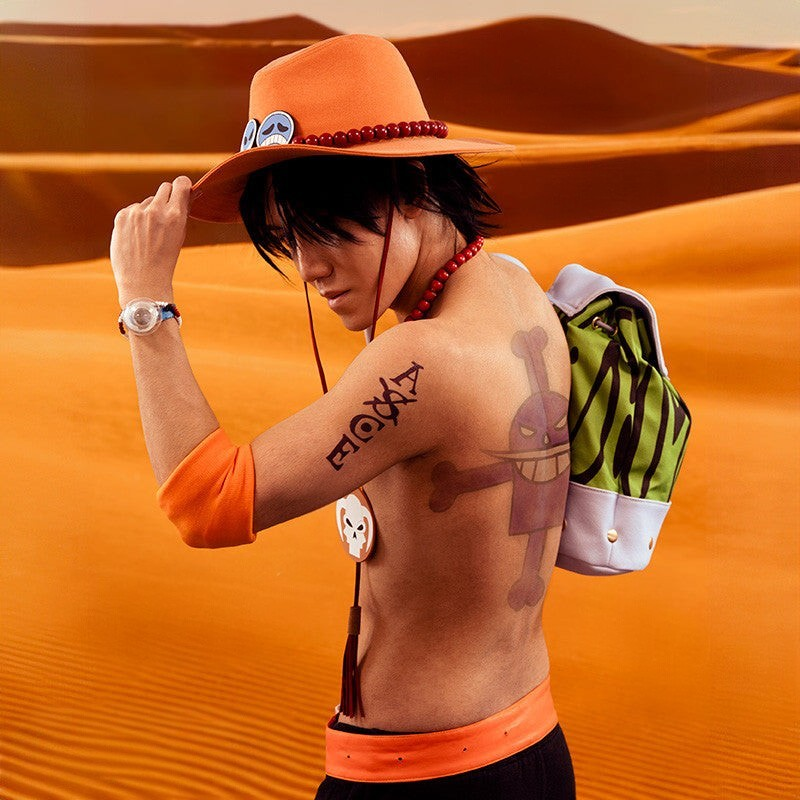 Fans Geek Store Portgas D. Ace cosplay hat with signature orange colour, red beads, and badges in a desert setting