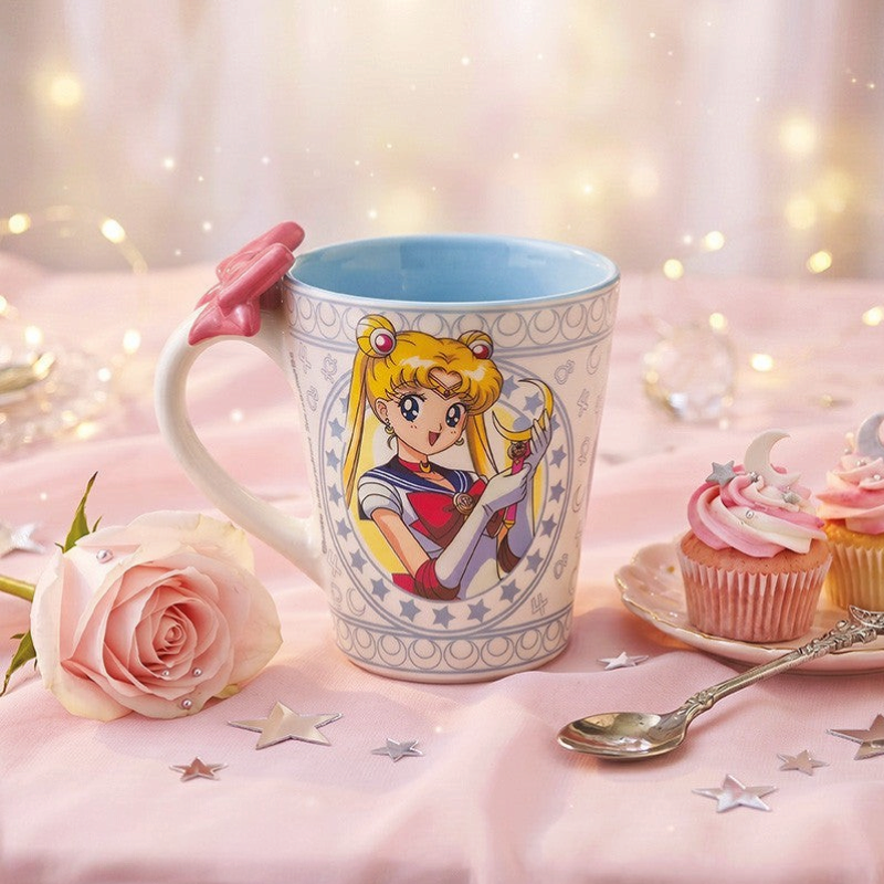 Fans Geek Store Sailor Moon ceramic mug with a 3D pink bow handle, featuring Sailor Moon and Luna illustrations.