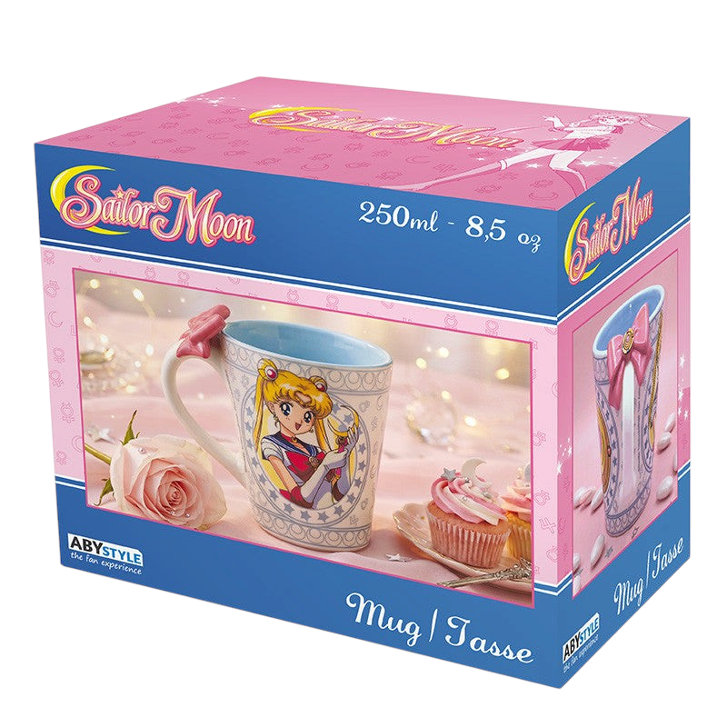 Fans Geek Store Sailor Moon ceramic mug in packaging featuring a 3D bow handle and Sailor Moon and Luna graphics.