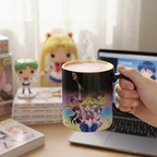 Fans Geek Store Sailor Moon heat-sensitive ceramic mug featuring Sailor Guardians and Tuxedo Mask with steaming drink