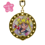 Fans Geek Store Sailor Moon lenticular metal keychain featuring Usagi Tsukino transforming into Sailor Moon
