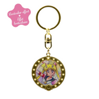 Fans Geek Store Sailor Moon lenticular keychain featuring Usagi Tsukino transforming into Sailor Moon in a gold frame