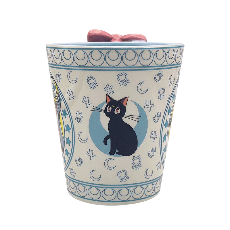 Fans Geek Store Sailor Moon and Luna ceramic mug with a pink 3D bow lid and blue celestial pattern