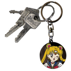 Fans Geek Store Sailor Moon metal keychain featuring a circular design with a winking Usagi Tsukino character portrait