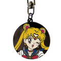 Fans Geek Store Sailor Moon metal keychain featuring a circular design with a winking anime character portrait