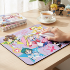 Fans Geek Store Sailor Moon mousepad featuring Sailor Warriors on a desk with a hand using a white computer mouse