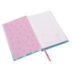 Fans Geek Store Sailor Moon A5 notebook open showing lined pages with Luna illustration and pink patterned endpapers