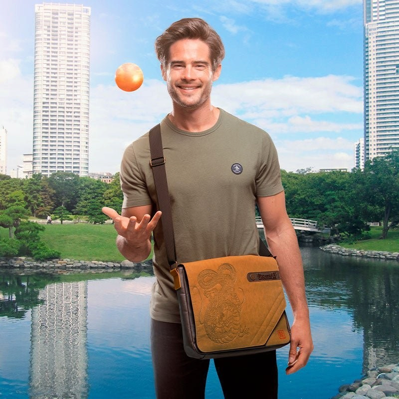 Fans Geek Store Dragon Ball Shenron shoulder bag with suede-effect finish and adjustable strap worn by a man