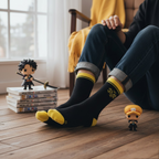 Fans Geek Store black One Piece Trafalgar Law socks with yellow accents worn by a person sitting near anime figures