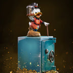 Fans Geek Store Uncle Scrooge McDuck statue on a safe, holding a money bag and a glass dome with a coin. Polystone, hand-painted.