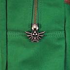 Fans Geek Store The Legend of Zelda backpack featuring a green polyester fabric and a metallic Hylian Crest zipper