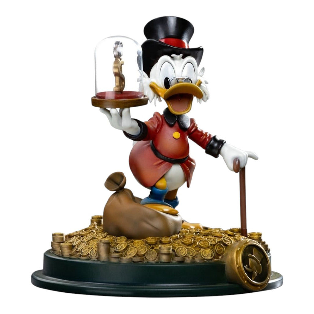 Iron Studios Uncle Scrooge McDuck statue, 17cm, holding a dollar sign under glass, with money bag and coins.